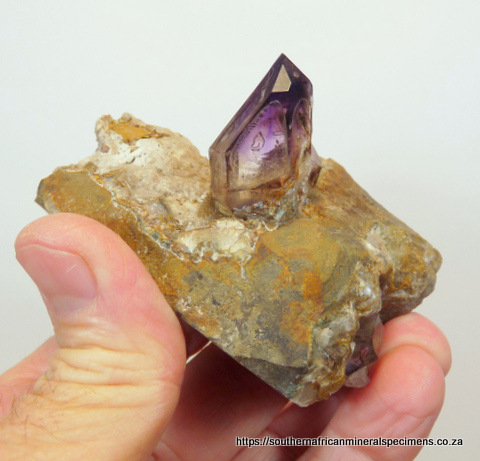 Three amethyst quartz crystals on matrix - repaired