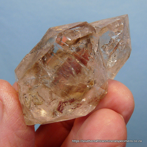 Quartz crystal group with faint smoky colouring (repaired)