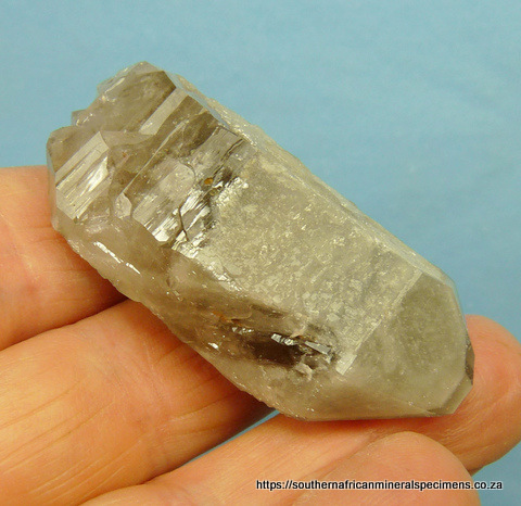 Quartz crystal with multiple generations quartz growth