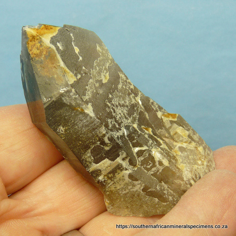 Smoky quartz crystal with hematite stained feldspar
