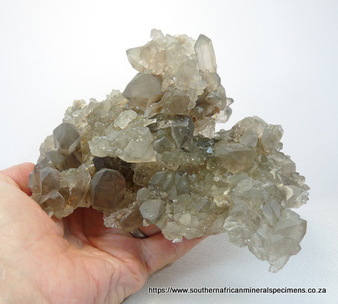 Large quartz crystal specimen with chlorite inclusions
