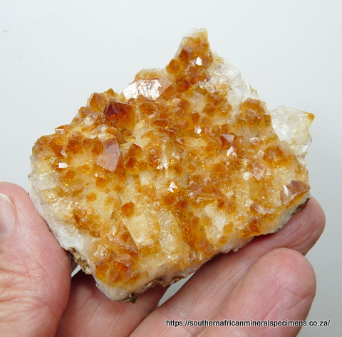 Citrine quartz crystals on rock matrix