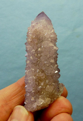 Light amethyst phantom quartz crystal specimen