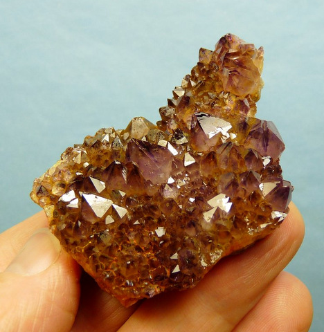 Amethyst quartz crystals with some yellow colouring, on matrix
