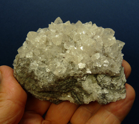 Calcite crystals on a conglomorate matrix